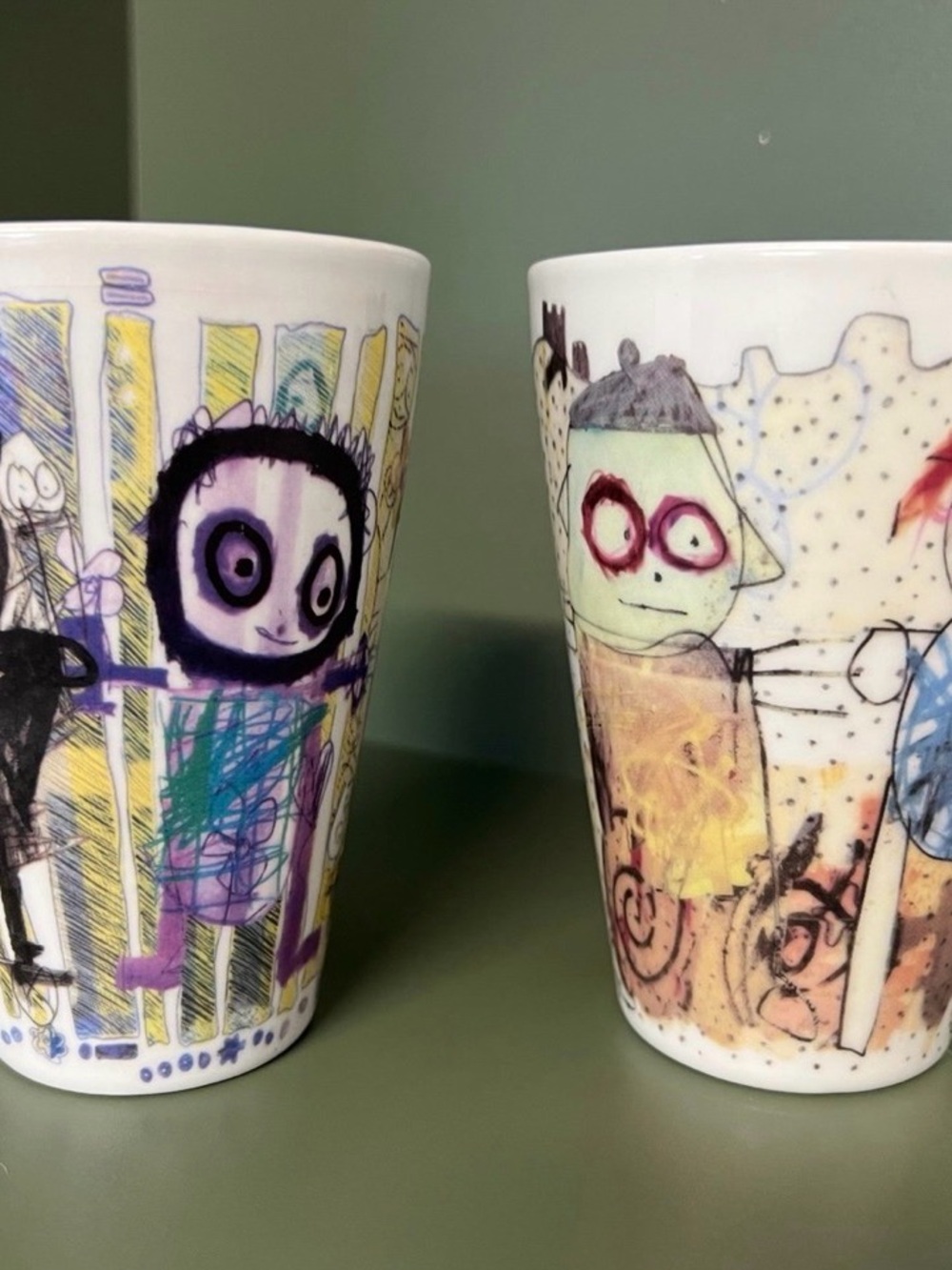 Artist Poul Pava Porcelain Cups by Aida “be friends wall” & “be friends beach”